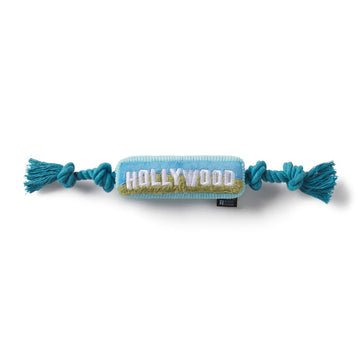 Treat your dog to the Hollywood 100 Exclusive Toy! Designed for durability and fun, this plush tribute to the iconic sign is a must-have for pet lovers.